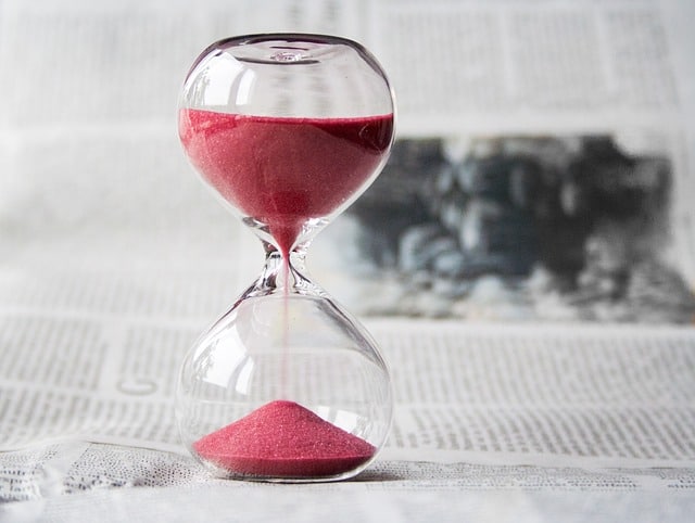 red sand in hourglass