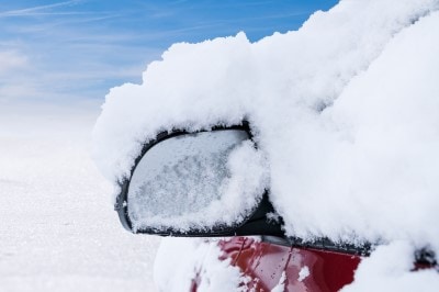 winter time snow on car