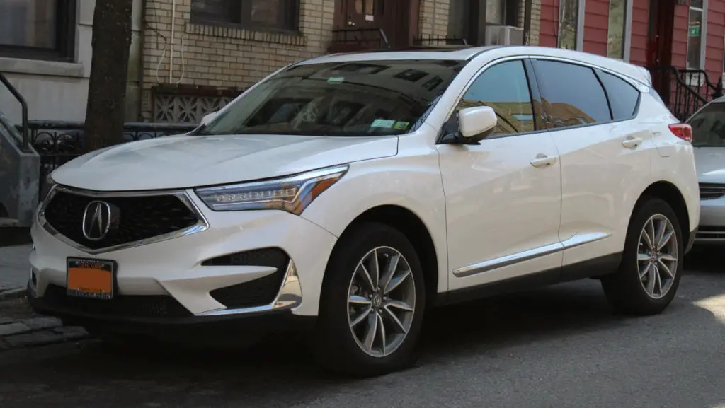 white acura mdx parked