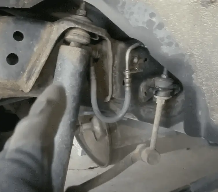 KDSS hydraulic line off the rear strut